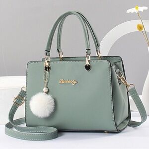Green Handbag with Pom Pom Charm